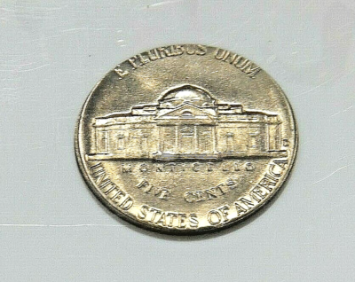 Side-by-side comparison of 1959 Jefferson Nickel showing flat Monticello steps versus sharply defined Full Steps example