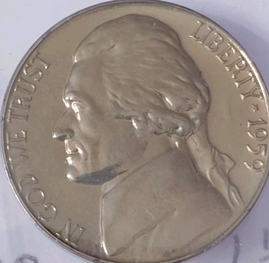 1959 Jefferson Nickel Full Steps close-up showing sharply defined Monticello staircase steps under magnification