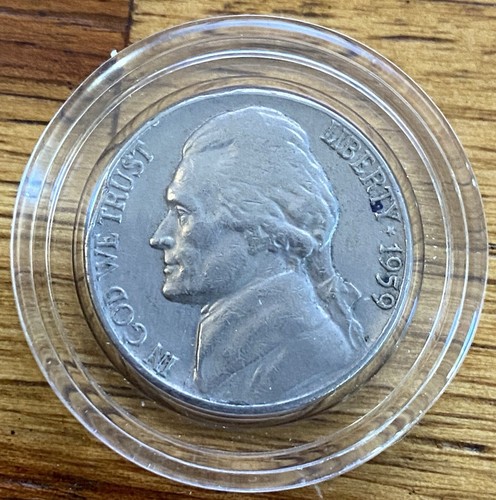 1959 Jefferson Nickel struck on a silver dime planchet showing smaller diameter and incomplete design elements